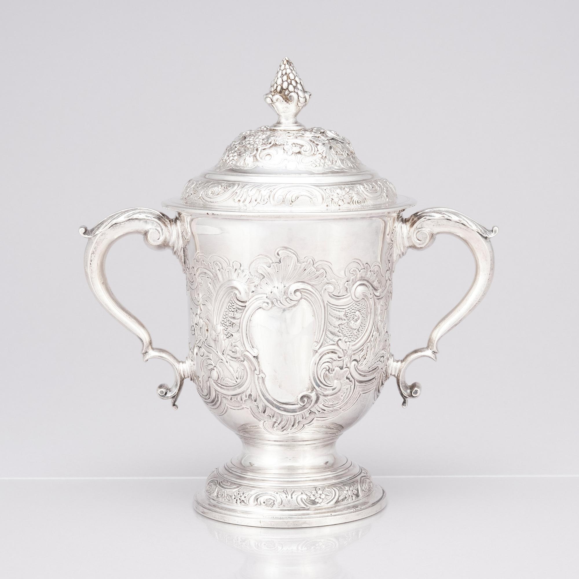 An English mid 18th century silver cup with lid, marks of Francis Crump, London.