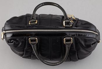 DOLCE & GABBANA, a black leather bag.