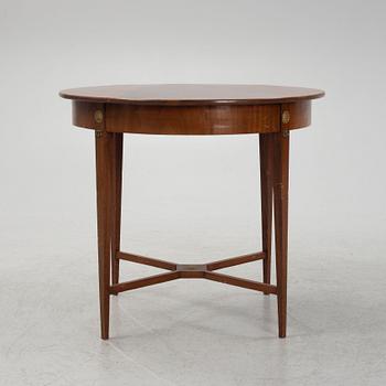 A mahogany veneered table, late 19th century.