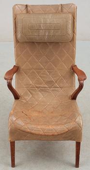 An Axel Larsson birch and leather easy chair, Bodafos, 1940's, model 1207.