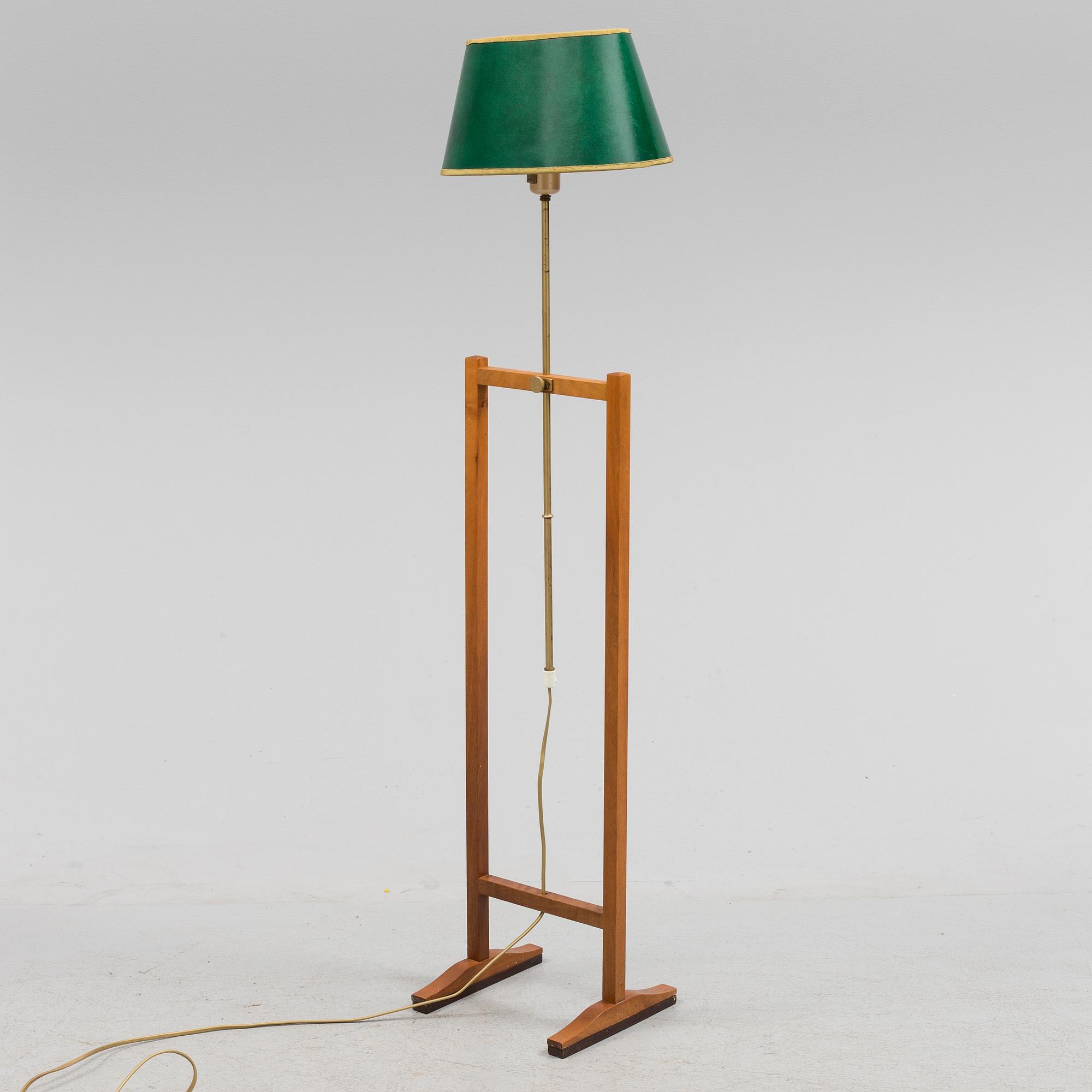 A MID-20TH CENTURY FLOOR LAMP KRYCKAN BY SVENSK TENN.