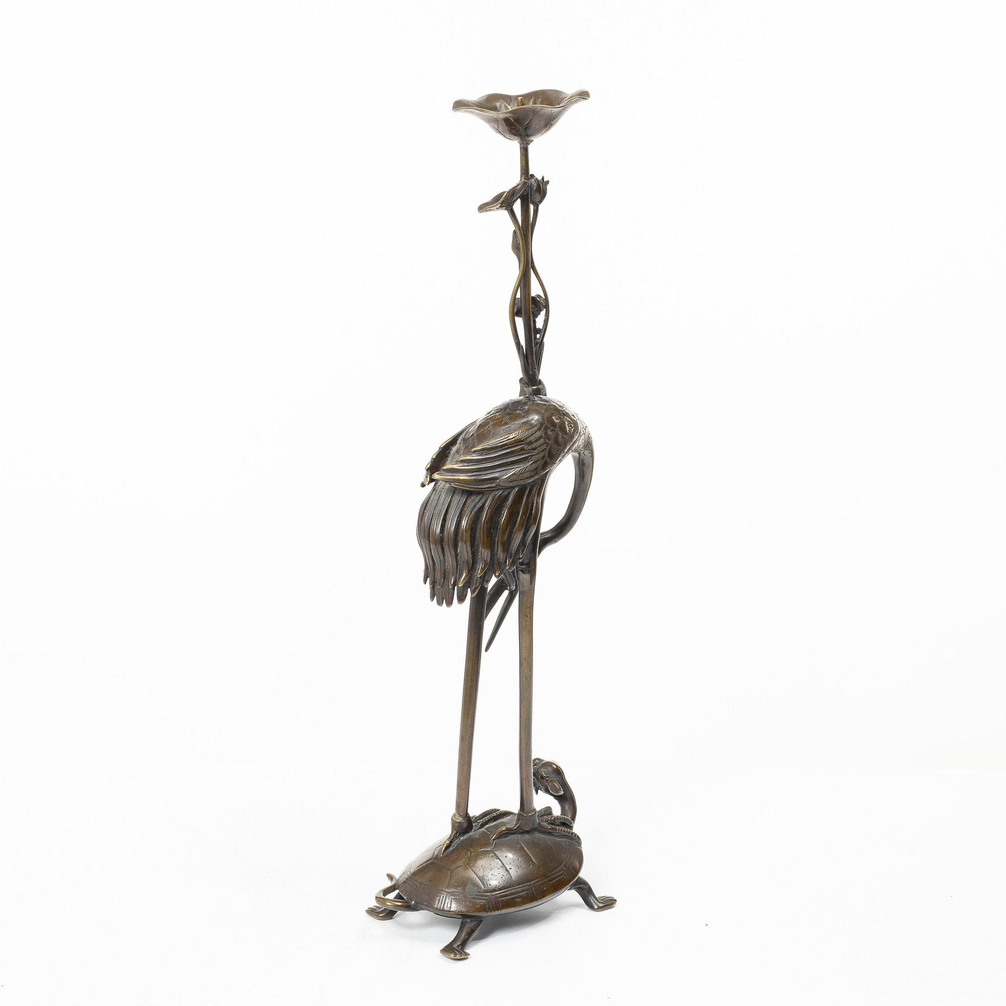 A bronze candle holder, Japan, 20th century.