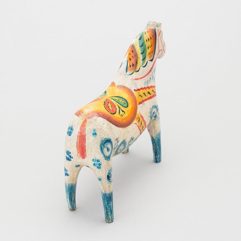 A painted folk art dala horse first half of the 20th century.