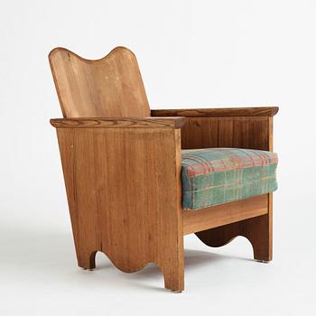 Axel Einar Hjorth, a stained pine easy chair "Utö", Nordiska Kompaniet, Sweden 1930's.