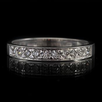 DIAMANTRING, 14K vitguld, diamanter tot. 0,20 ct. Vikt 1,7 g.