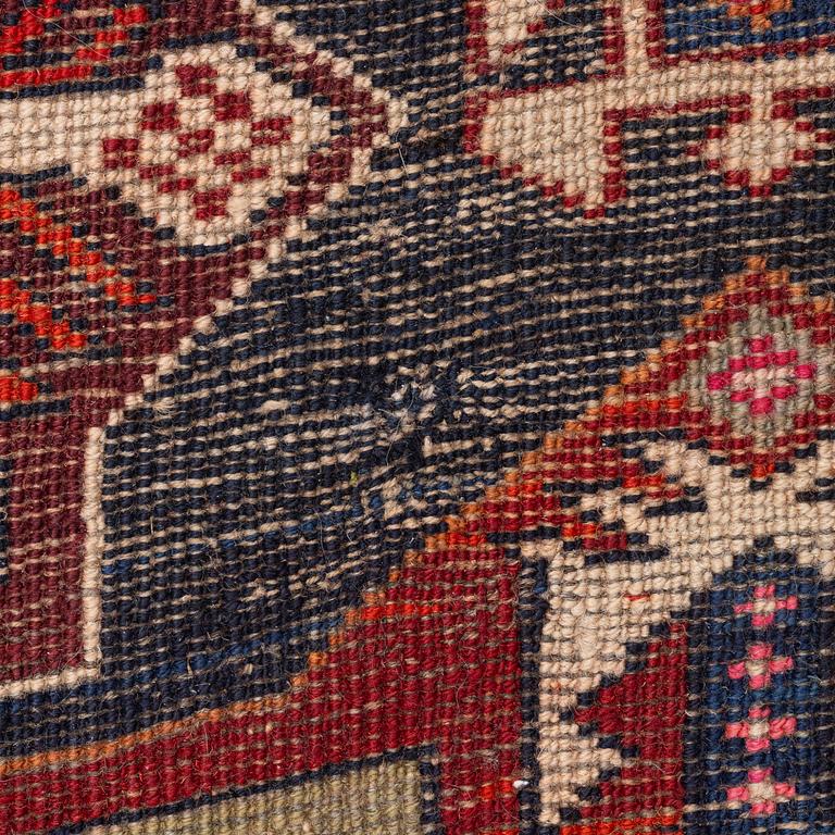 A semi-antique Anatolian runner, c. 409 x 159 cm.