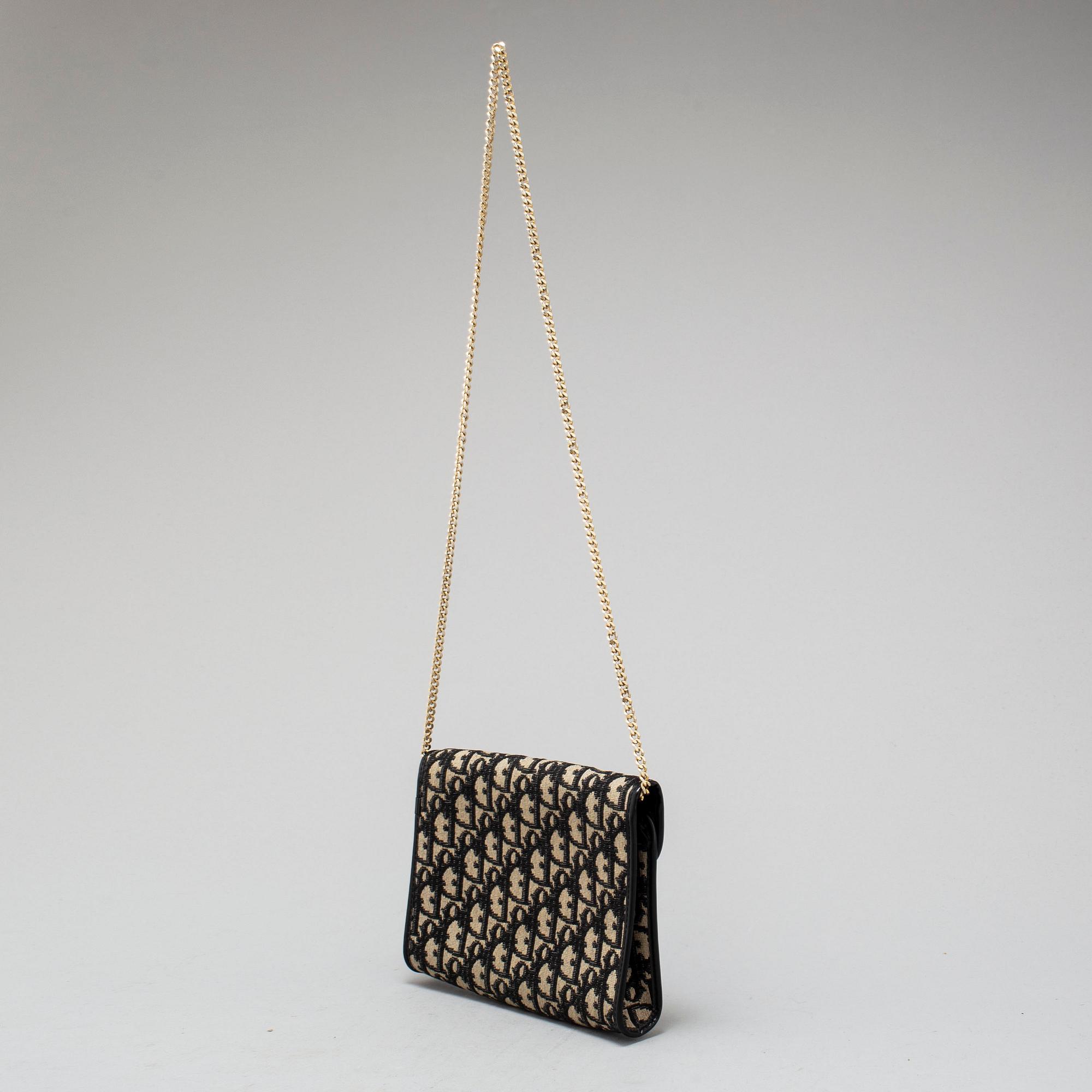CHRISTIAN DIOR monogram canvas shoulder bag. Bukowskis