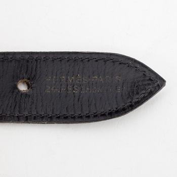 HERMÈS, a black leather belt, reportedly from the 1950s.