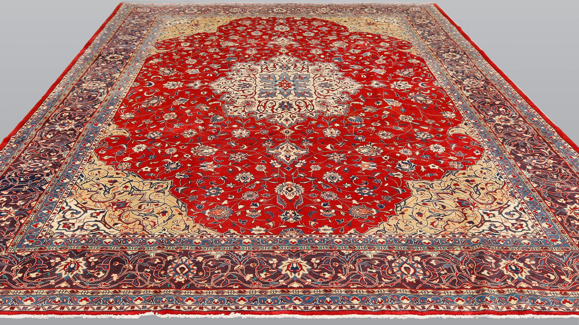 A Sarouk carpet, approximately 365 x 277 cm.