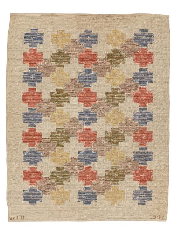 Swedish design, a carpet, knotted pile in relief, ca 178,5-179,5 x 137-140,5 cm, signed and dated at the back: SKLH 1944.