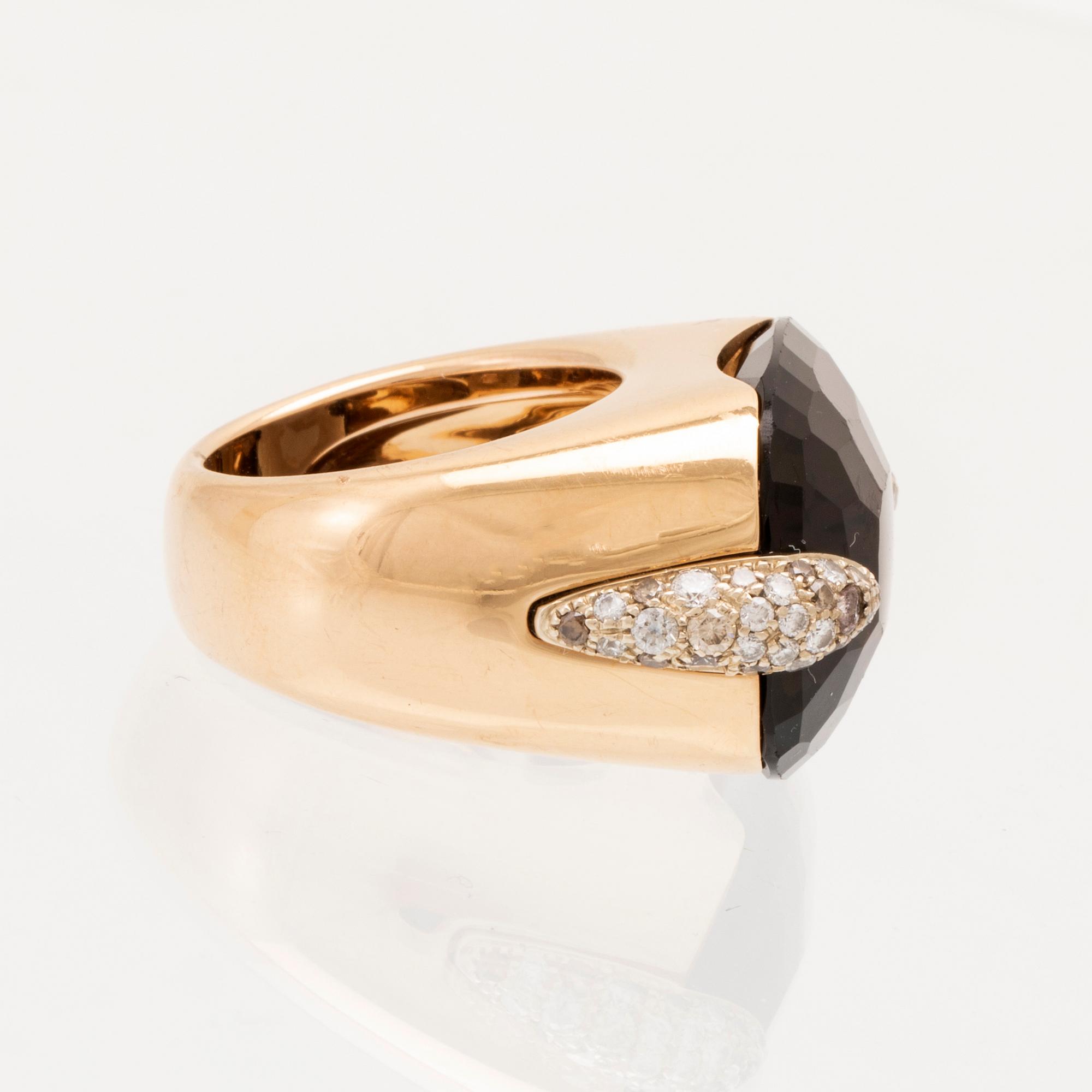 An 18K gold Pomellato "Pin Up" ring set with smoky quartz and round brilliant-cut diamonds.