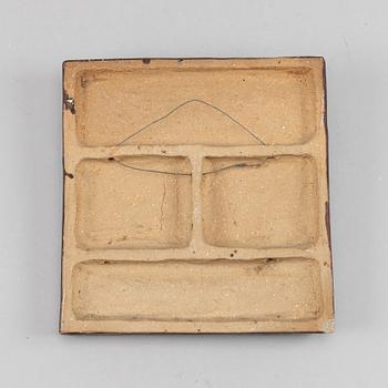 A stoneware wall relief by Åke Holm, signed.