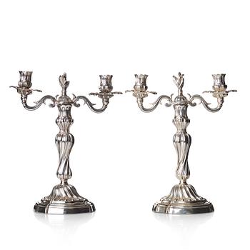112. A pair of Louis XV mid 18th century candelabra.