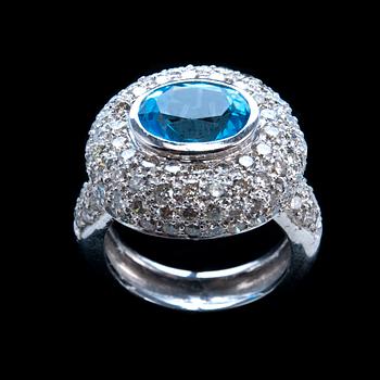 A RING, topaz c. 2.70 ct and 117 brilliant cut diamonds c. 1.75 ct.