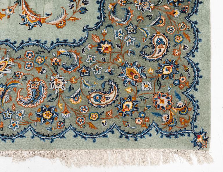 A Keshan carpet, signed, c. 376 x 270 cm.