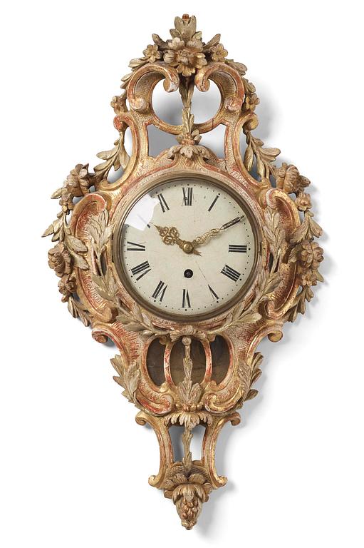 A Swedish Rococo giltwood cartel clock, Stockholm, later part of the 18th century.