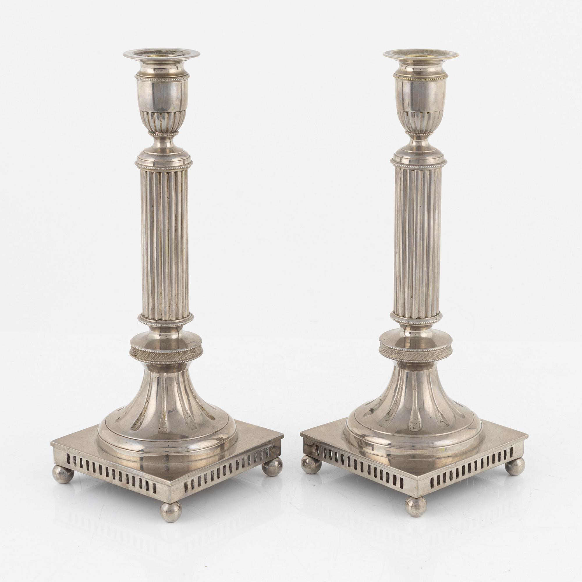 Carl Keijser & Co, a pair of Gustavian style candlesticks, first half of the 20th Century.