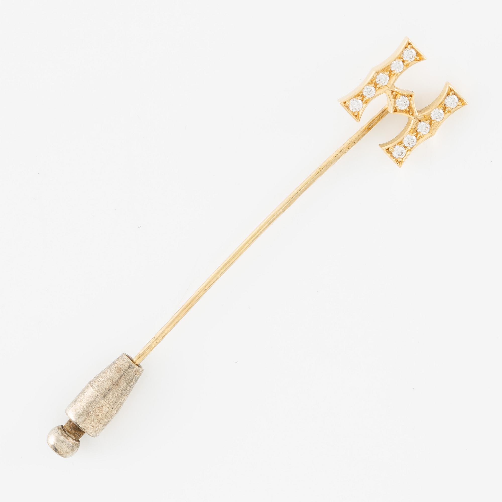 Kravattnål, i form av "H", 18K guld med briljantslipade diamanter.