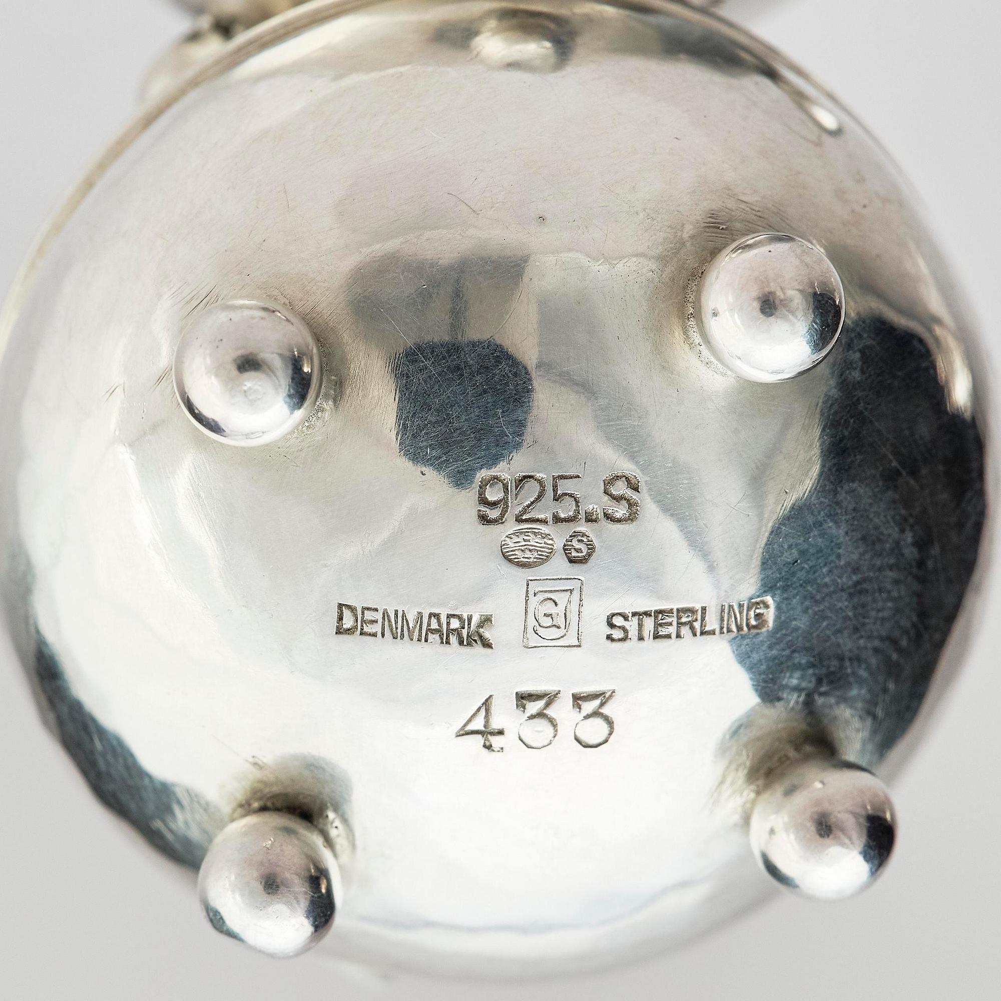 Georg Jensen, four sterling silver casters, design Harald Nilesen, Copenhagen 1933-44, one Copenhagen after 1945.