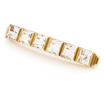 577. Wiwen Nilsson, a brooch, 18K gold with faceted rock crystal, Lund 1942.