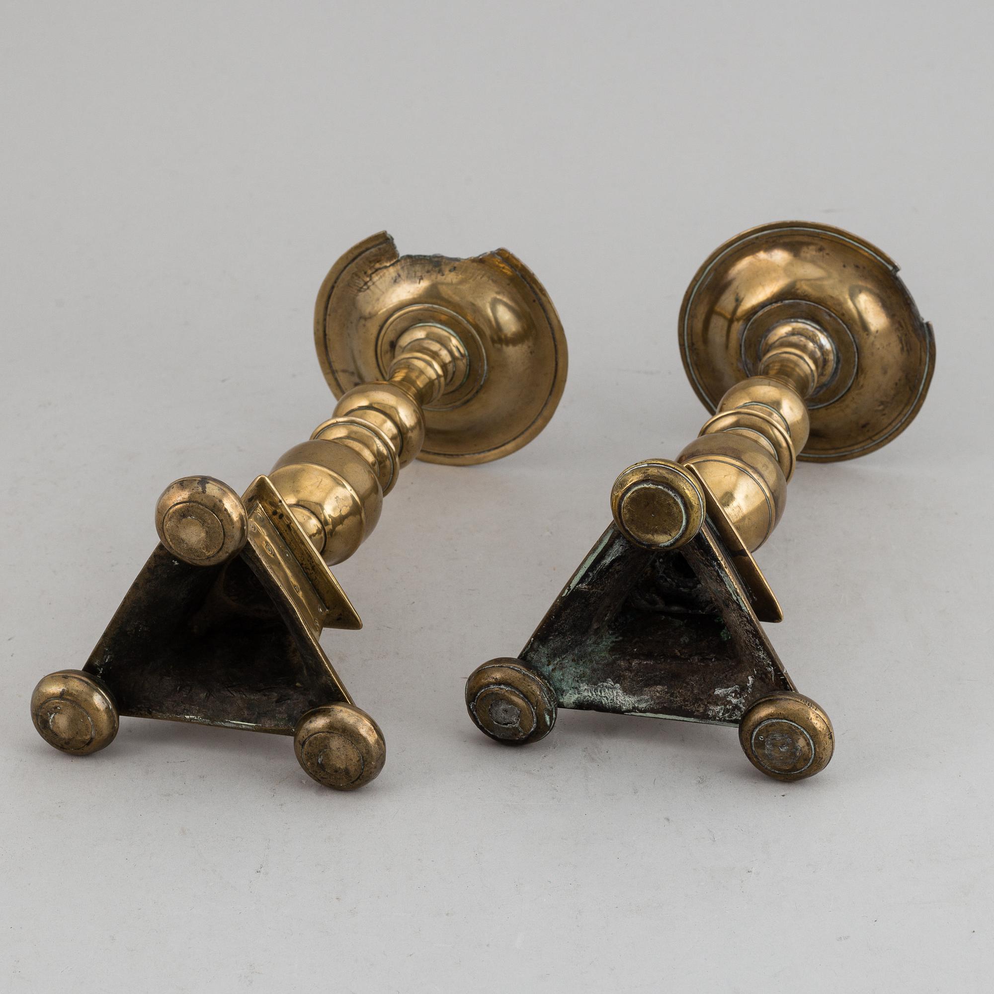 A pair of 17th century bronze candlesticks.