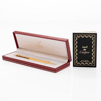 Cartier, must de Cartier, a "Trinity" ballpoint pen.