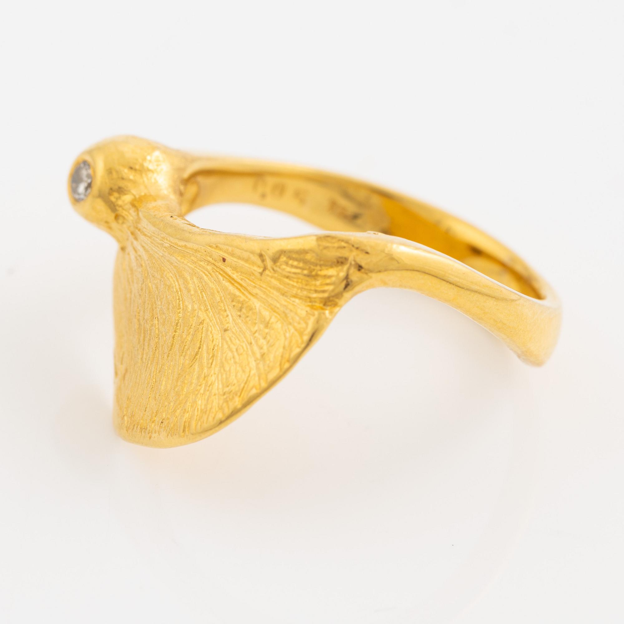 Ring, 18K guld med en rund briljantslipad diamant.