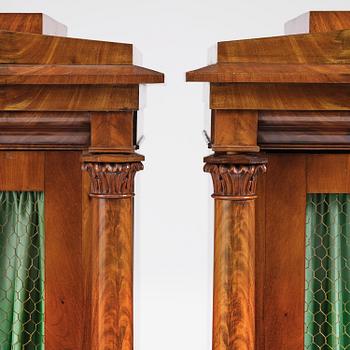 A pair of Swedish Empire mahogany bibliothèques, Stockholm, early 18th century.
