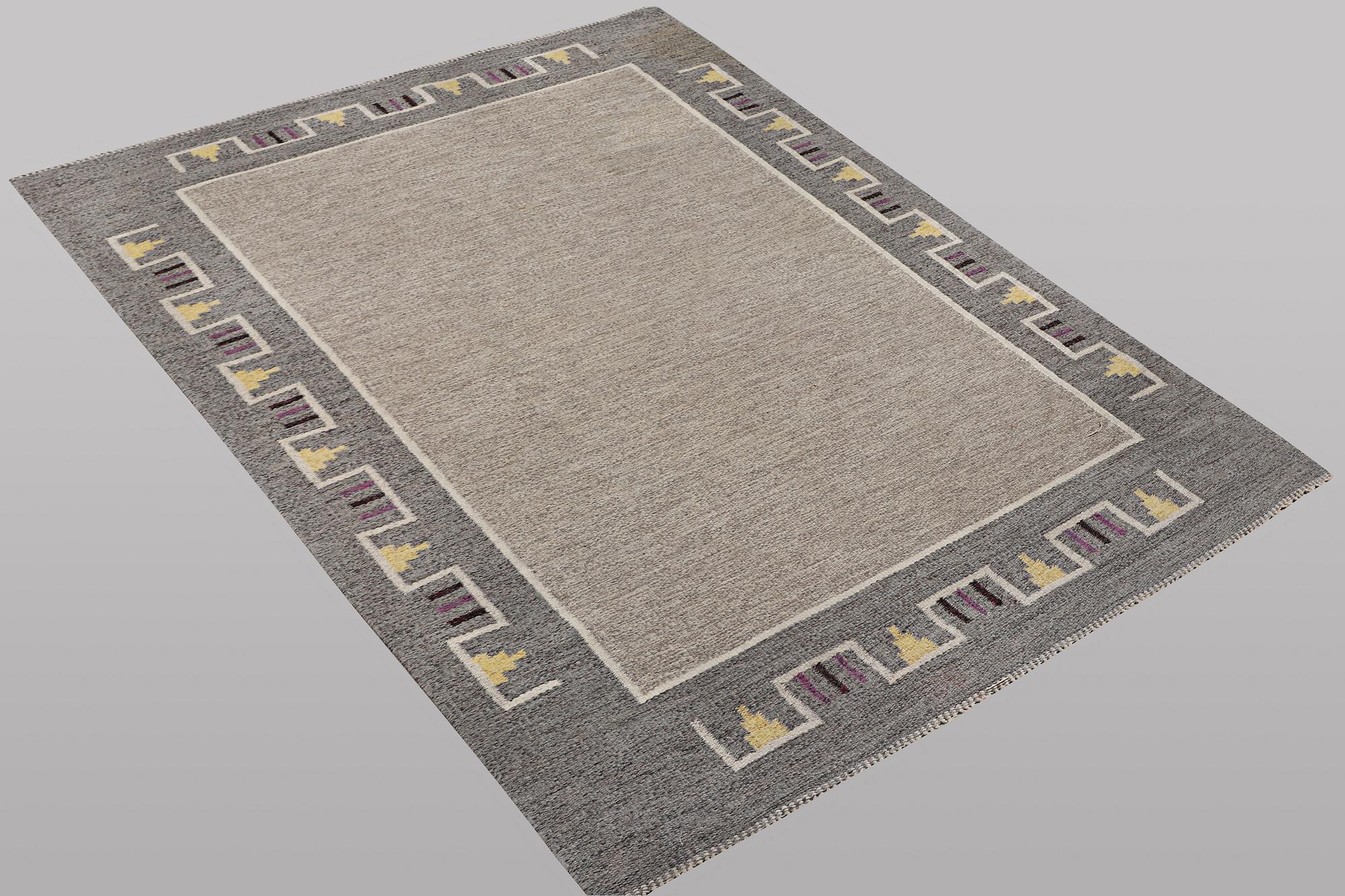 A carpet, flat weave, ca 240 x 165 cm.