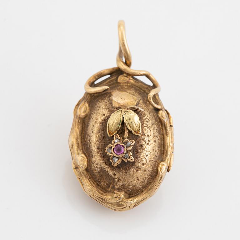 Cabochon cut ruby and rose cut diamond pendant.