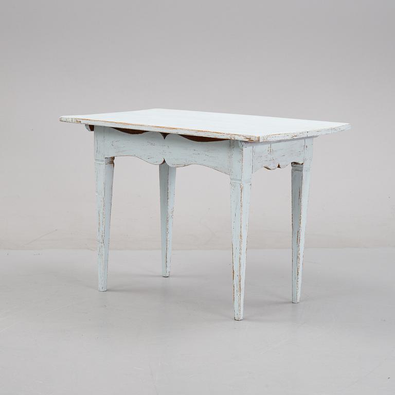 A painted table, 19th Century.
