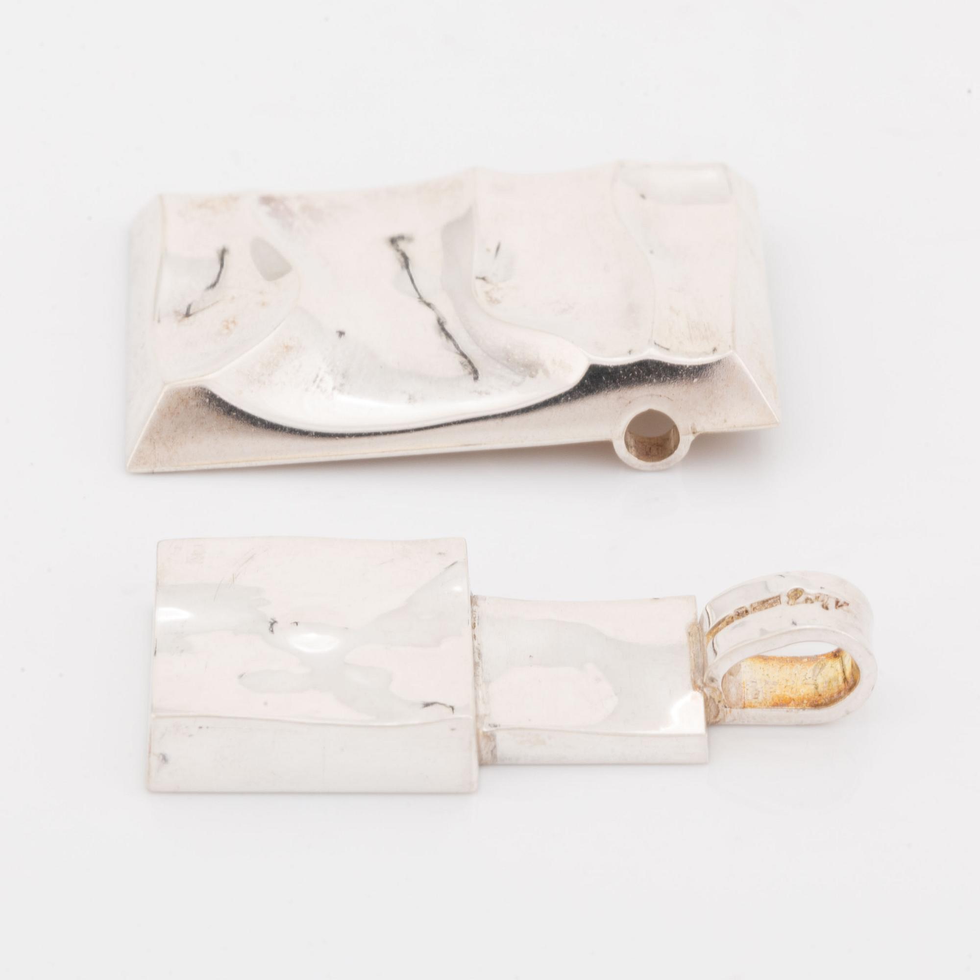Rolf Karlsson two silver pendants.