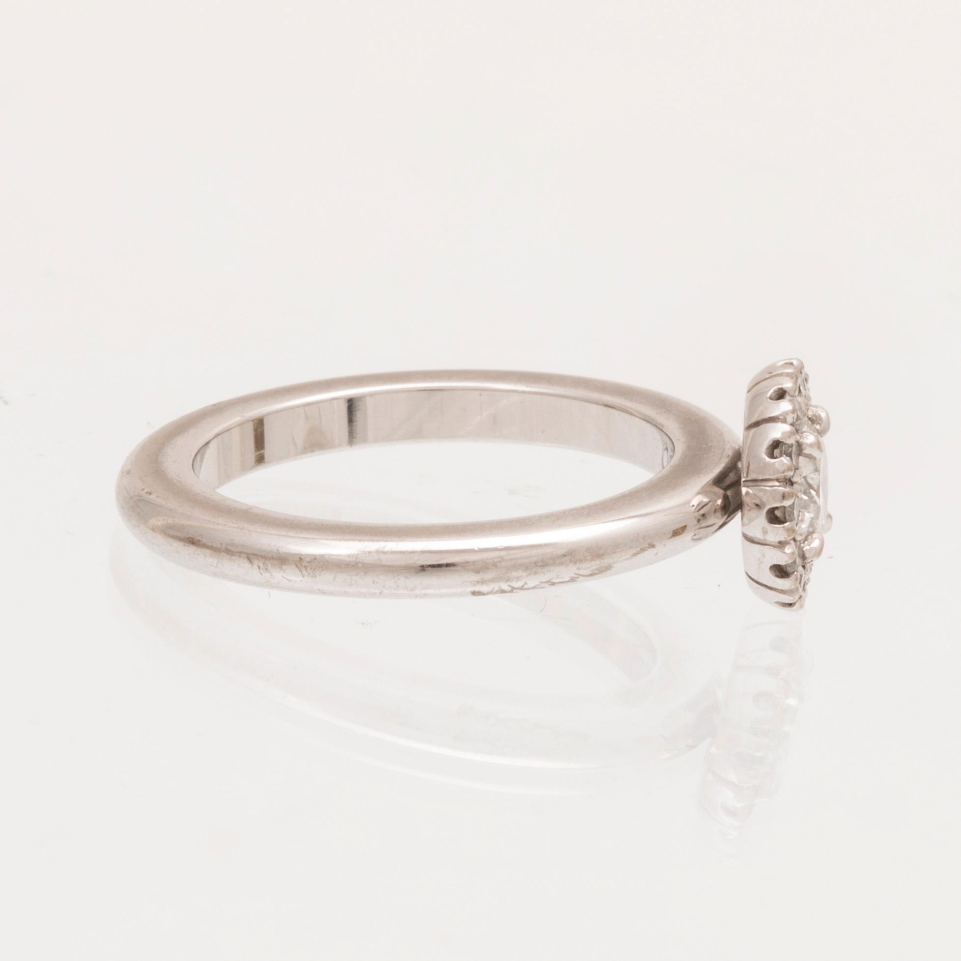 An 18K white gold ring with round brilliant cut diamonds by Engelbert, with GIA dossier.