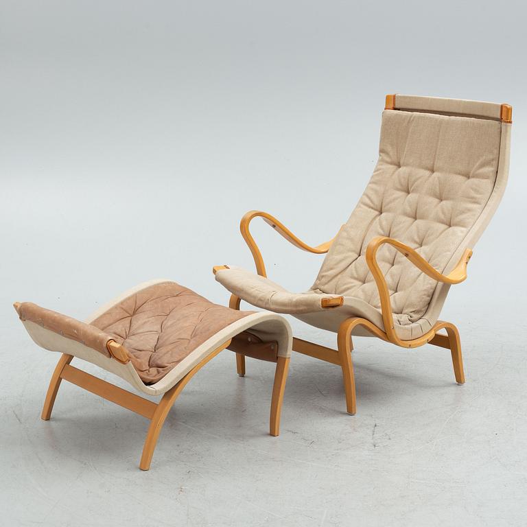 Bruno Mathsson armchair, "Pernilla" with footstool, Dux, late 20th century.