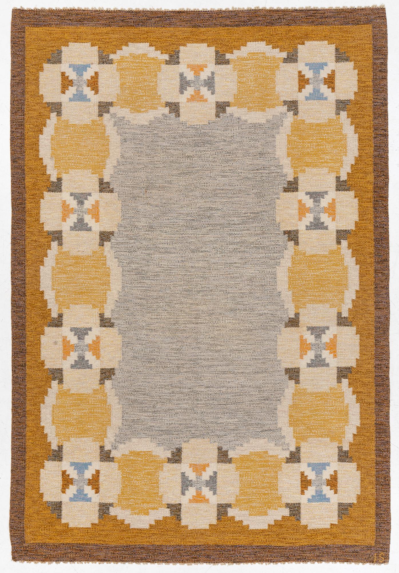 Ingegerd Silow, a carpet, flat weave, c 286 x 197 cm, signed IS.
