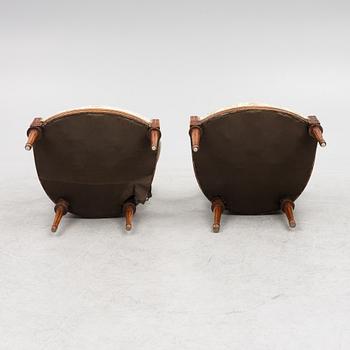 A pair of late Gustavian open armchairs, Stockholm, late 18th century.