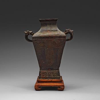 An archaistic bronze beaker vase.