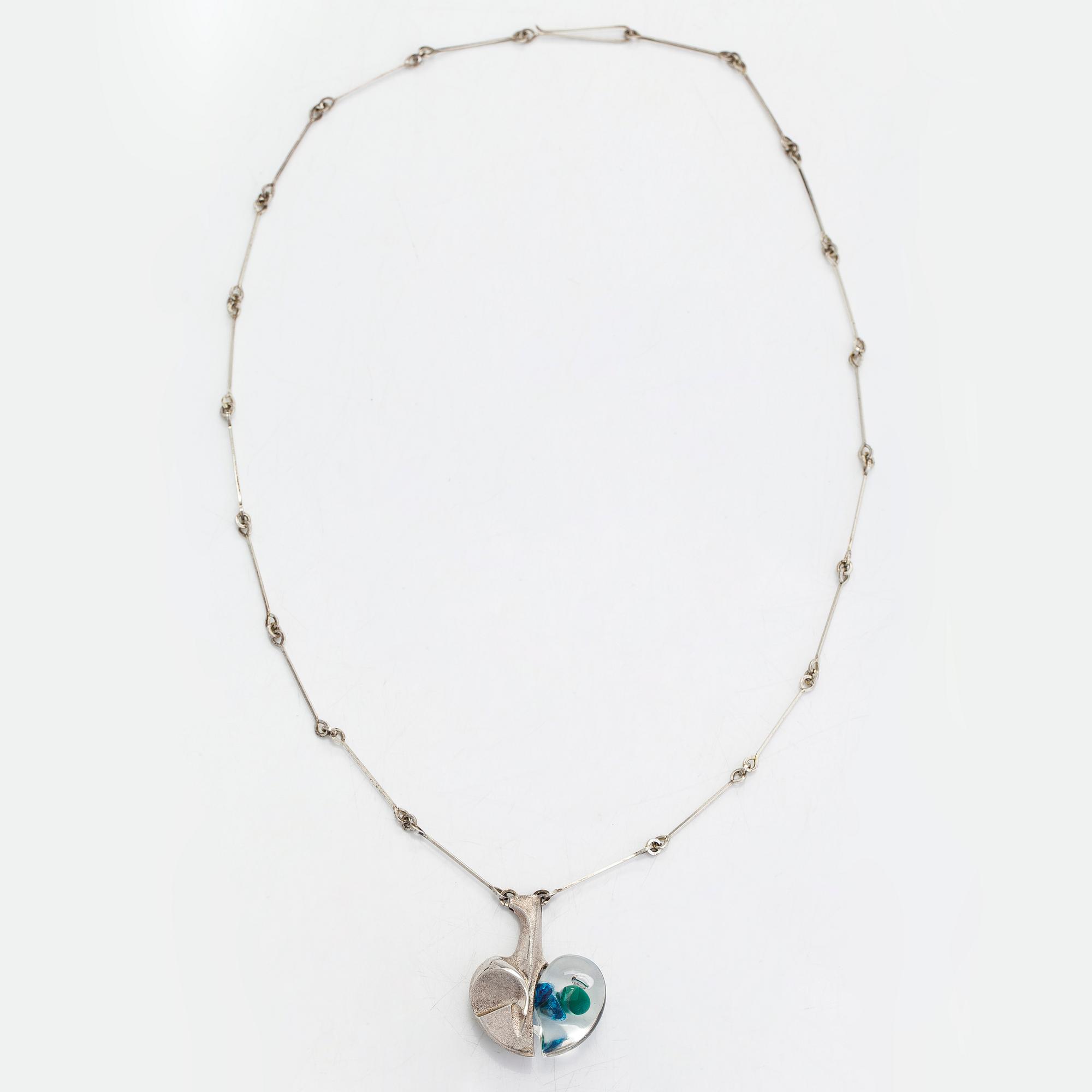 Björn Weckström, Kaulakoru "Avaruusomena", sterlinghopeaa ja akryylia. Lapponia 1976.