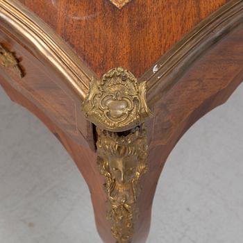 A French Louis XV-style rosewood marquetry 'Bureau plat aux bustes de femmes", late 19th century.