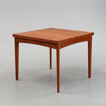 A teak dining group, table and six chairs model no. 49, designed by Erik Buch, Denmark, in 1949.