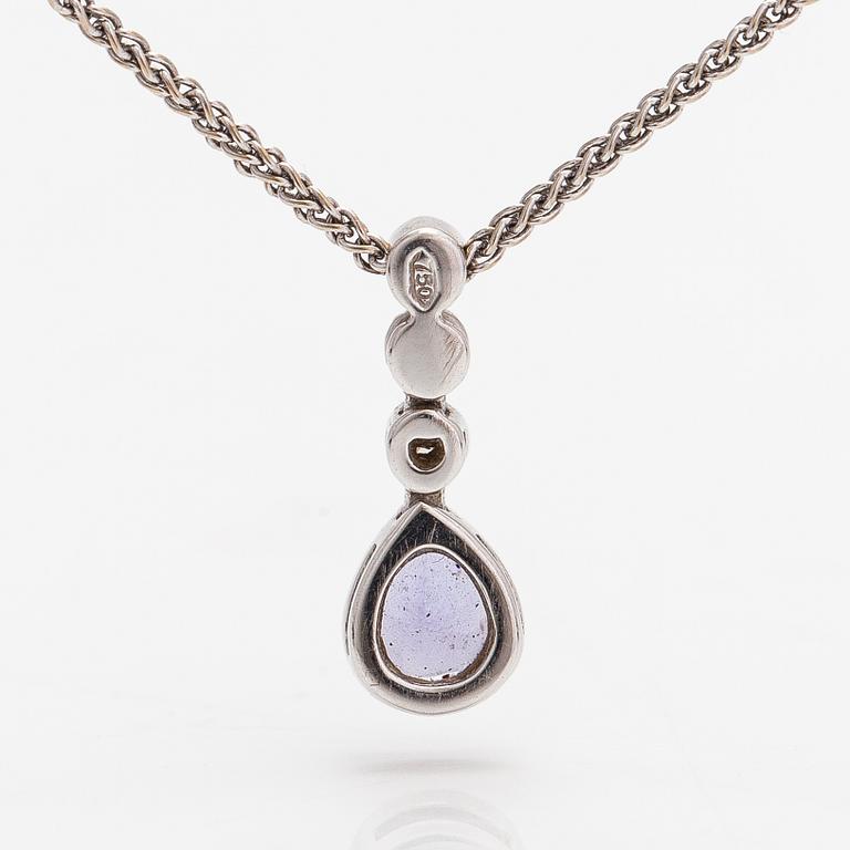 An 18K white gold necklace with a tanzanite and diamonds ca. 0.06 ct in total.