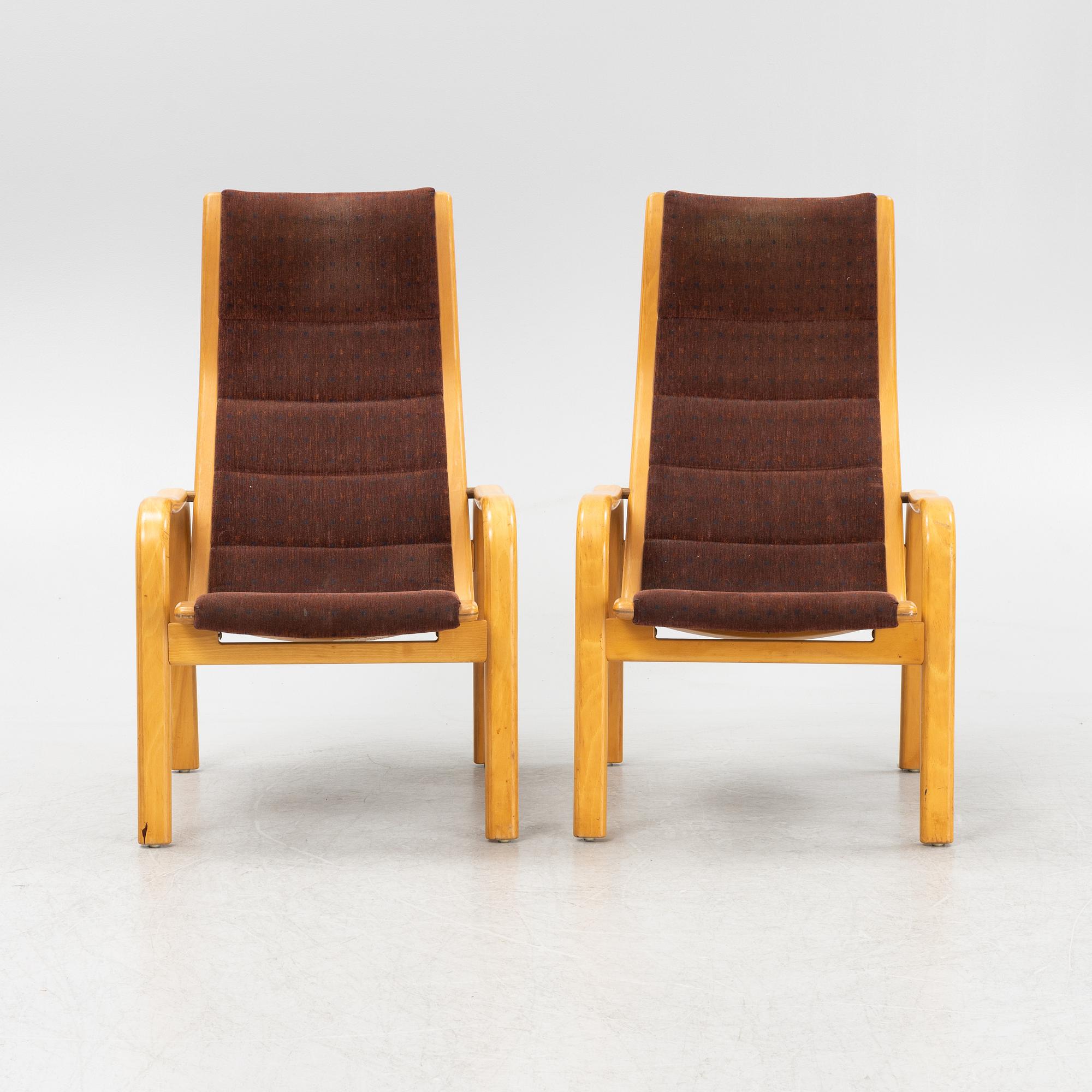 Yngve Ekström, a pair of armchairs, Swedese, late 20th century.