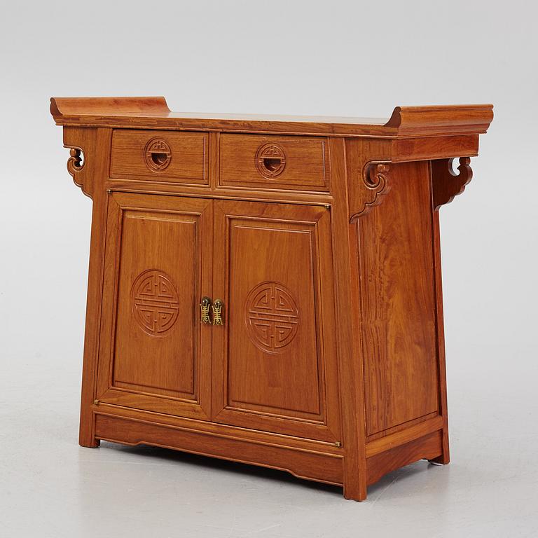 A Chinese hardwood cabinet, second half of the 20th century.