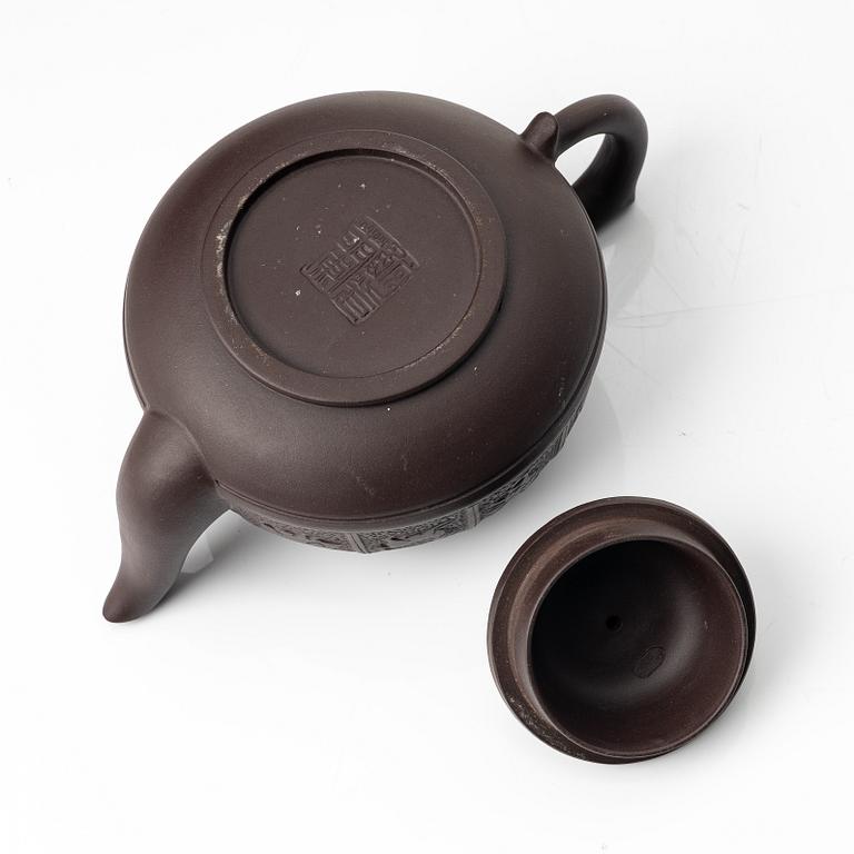 Bao Zhenglan, A brown yixing 'zodiac' teapot, China, 1990s.