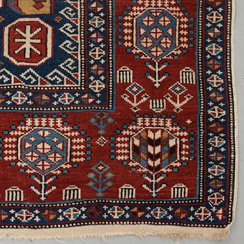 A CARPET, an antique/semi-antique Shirvan, ca 234 x 130 cm (as well as the ends with 1 cm flat weave).