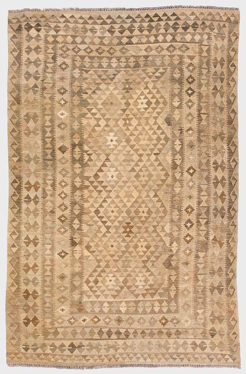 A Kilim carpet, ca. 305 x 196 cm.