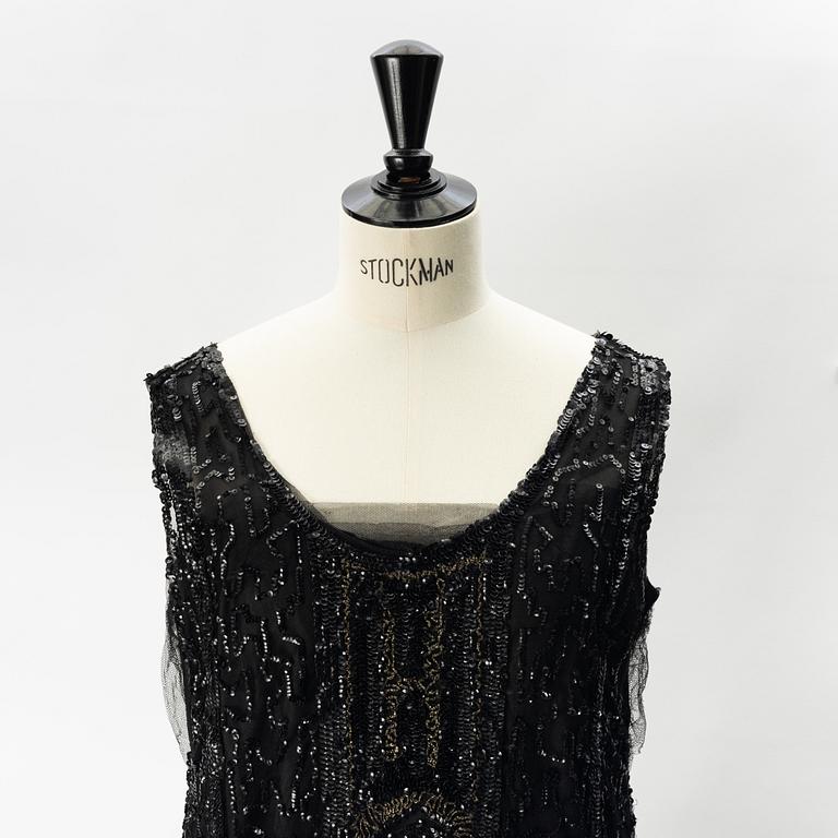 A sequin embroidered 1920's dress.