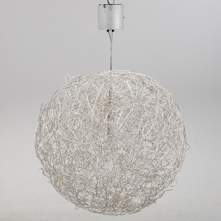 A 'Fil de Fer Ovale' ceiling light by Enzo Cattelini.