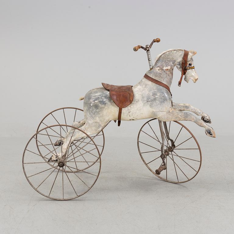 A wooden toy horse from the late 19th century.