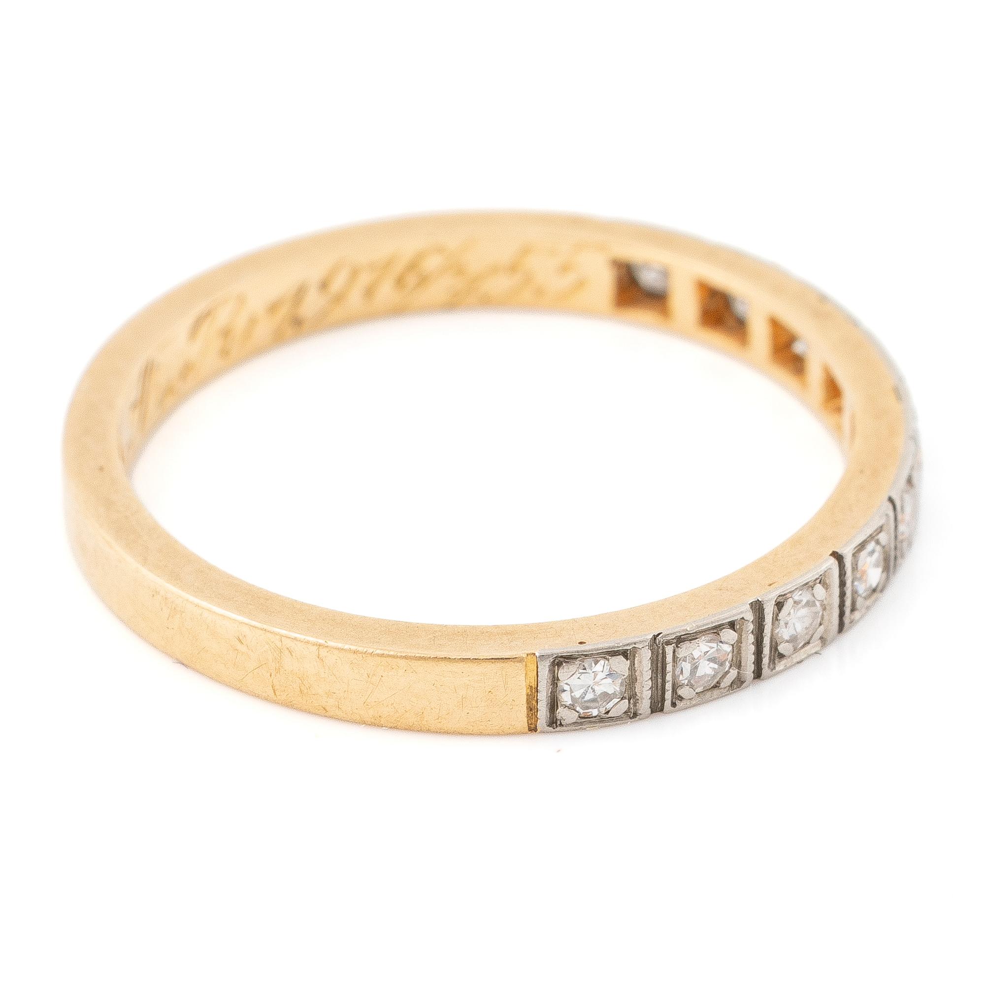 18K gold half-eternity ring with octagonal-cut diamonds.